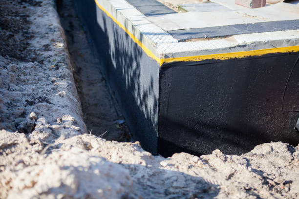 Professional Exterior Waterproofing technician working in Worthington, KY